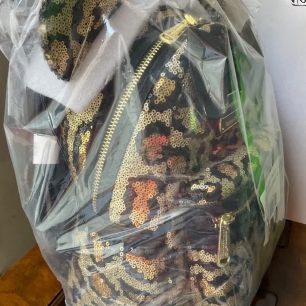 LOINGEFLY DISNEY PARKS MINNIE CHEETAH PRINT SEQUENCED BACKPACK RARE NWT - Picture 4 of 4